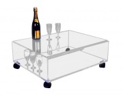 Table basse en plexiglas sur roulettes 